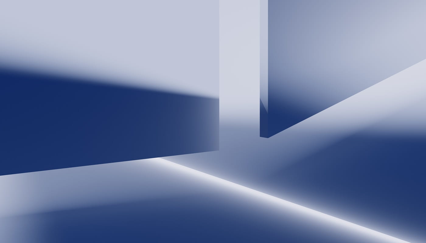 Abstract geometric shapes with sharp edges casting blue and white light and shadows.